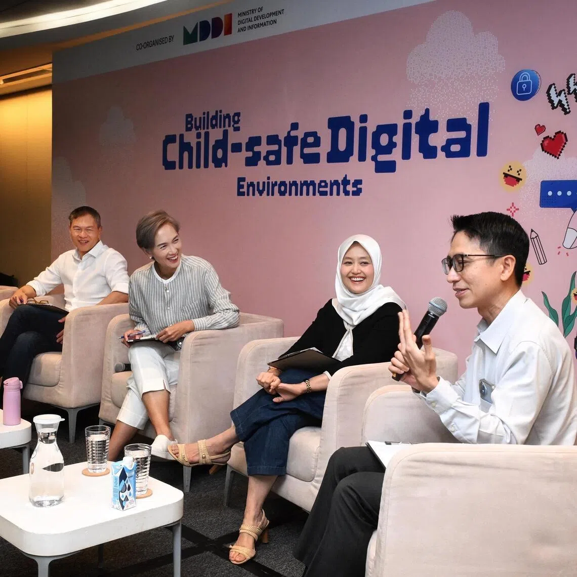 (From right) Psychiatrist Lim Choon Guan, Minister of State Rahayu Mahzam, Minister Josephine Teo, TOUCH Community Services chief executive James Tan, speaking during a panel moderated by ST associate editor Karamjit Kaur on July 25.