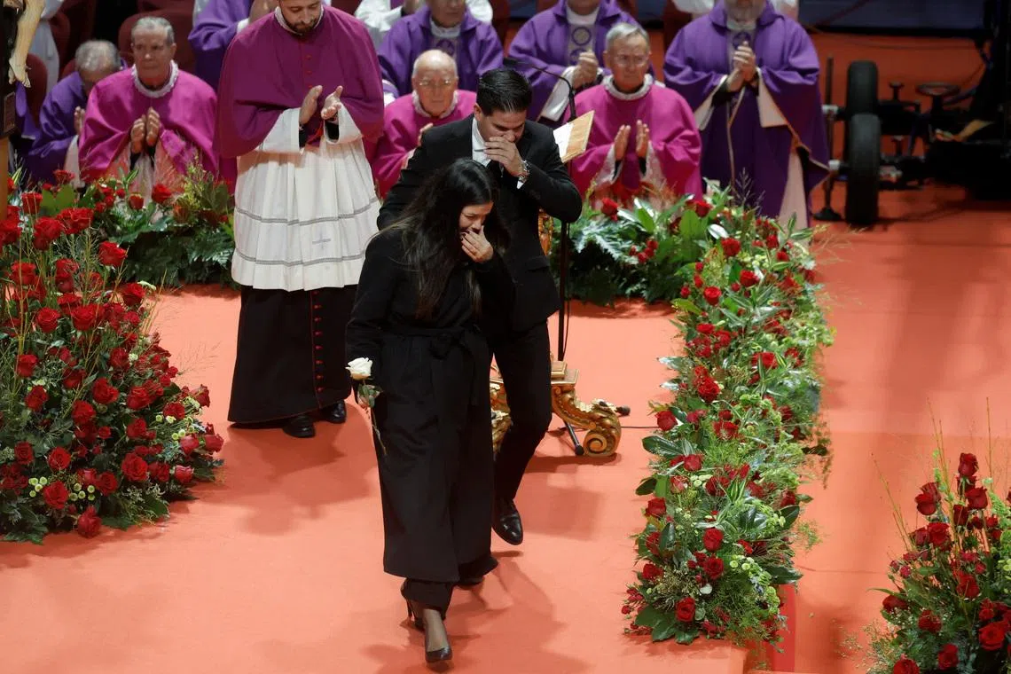 Lilian Sainz, a relative of a victim of the deadly derailment of two high-speed trains in Adamuz, reacts after giving a speech during a funeral mass in memory of the victims, at the Carolina Marin Sports Palace in Huelva, Spain, January 29, 2026. REUTERS/Jon Nazca
