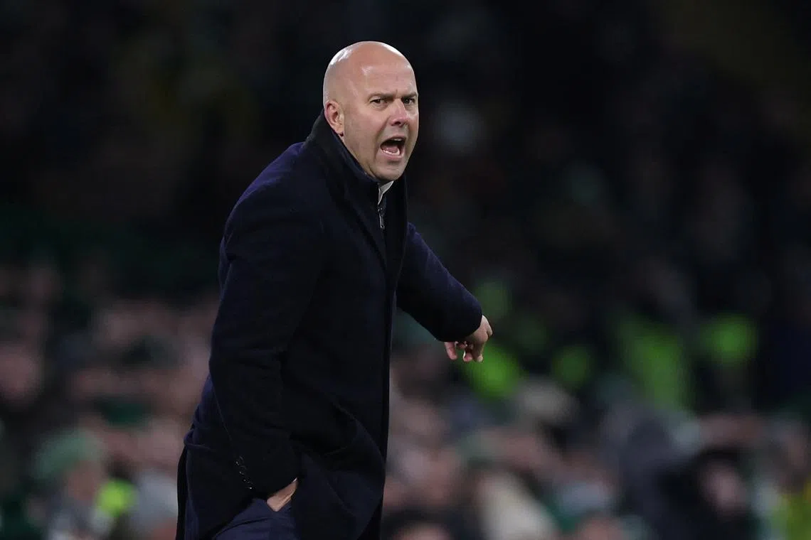 FILE PHOTO: Soccer Football - Champions League - Group E - Celtic v Feyenoord - Celtic Park, Glasgow, Scotland, Britain - December 13, 2023 Feyenoord coach Arne Slot reacts REUTERS/Russell Cheyne/File Photo