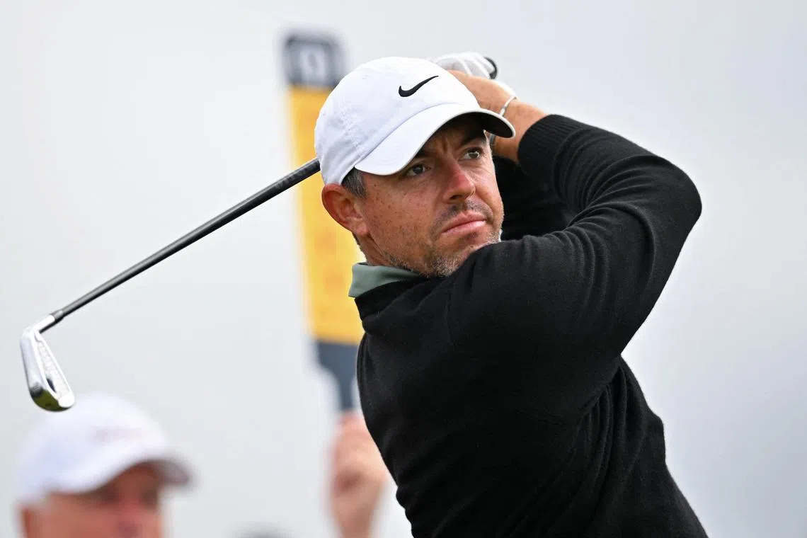 Northern Ireland's Rory McIlroy watching his iron shot from the 18th tee during practice ahead of the 153rd British Open at Royal Portrush golf club in Northern Ireland on July 15, 2025.