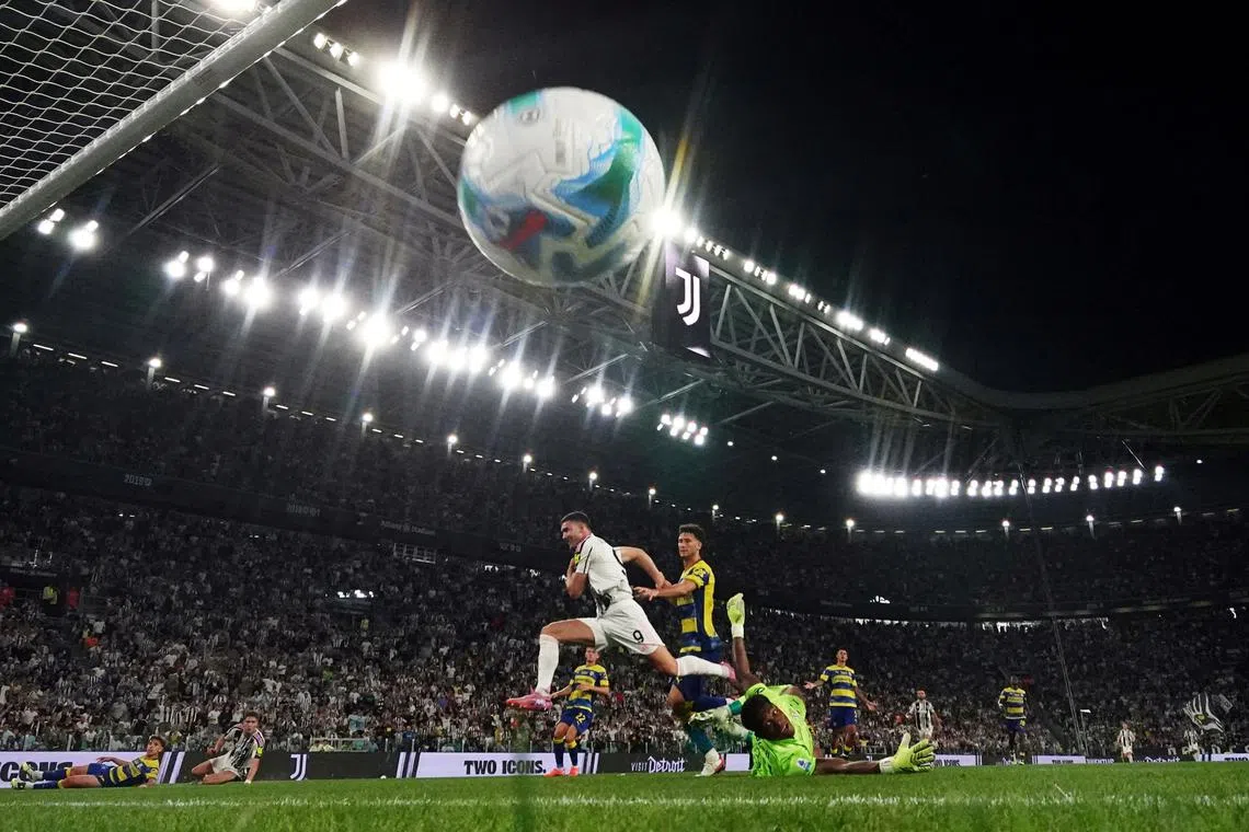 FILE PHOTO: Soccer Football - Serie A - Juventus v Parma - Allianz Stadium, Turin, Italy - August 24, 2025 Juventus' Dusan Vlahovic scores their second goal REUTERS/Alberto Lingria/ File Photo