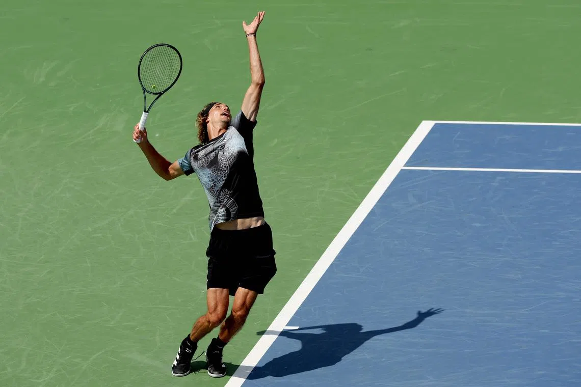 Alexander Zverev of Germany serves to Daniil Medvedev of Russia during the Western & Southern Open.