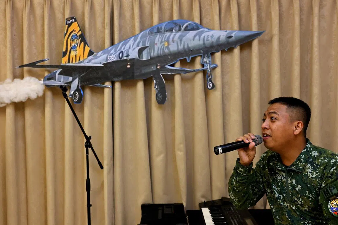 Hsu Shao-qiang, 29, a member of the Taiwan's Air Force "Tiger Band" sings during band practice at Chihhang Air Base in Taitung, Taiwan, November 16, 2022. REUTERS/Ann Wang