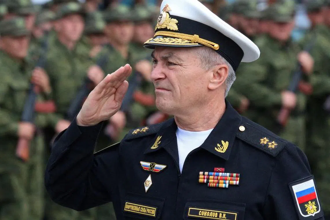FILE PHOTO: Commander of the Russian Black Sea Fleet Vice-Admiral Viktor Sokolov salutes during a send-off ceremony for reservists drafted during partial mobilisation, in Sevastopol, Crimea September 27, 2022. REUTERS/Alexey Pavlishak/File Photo