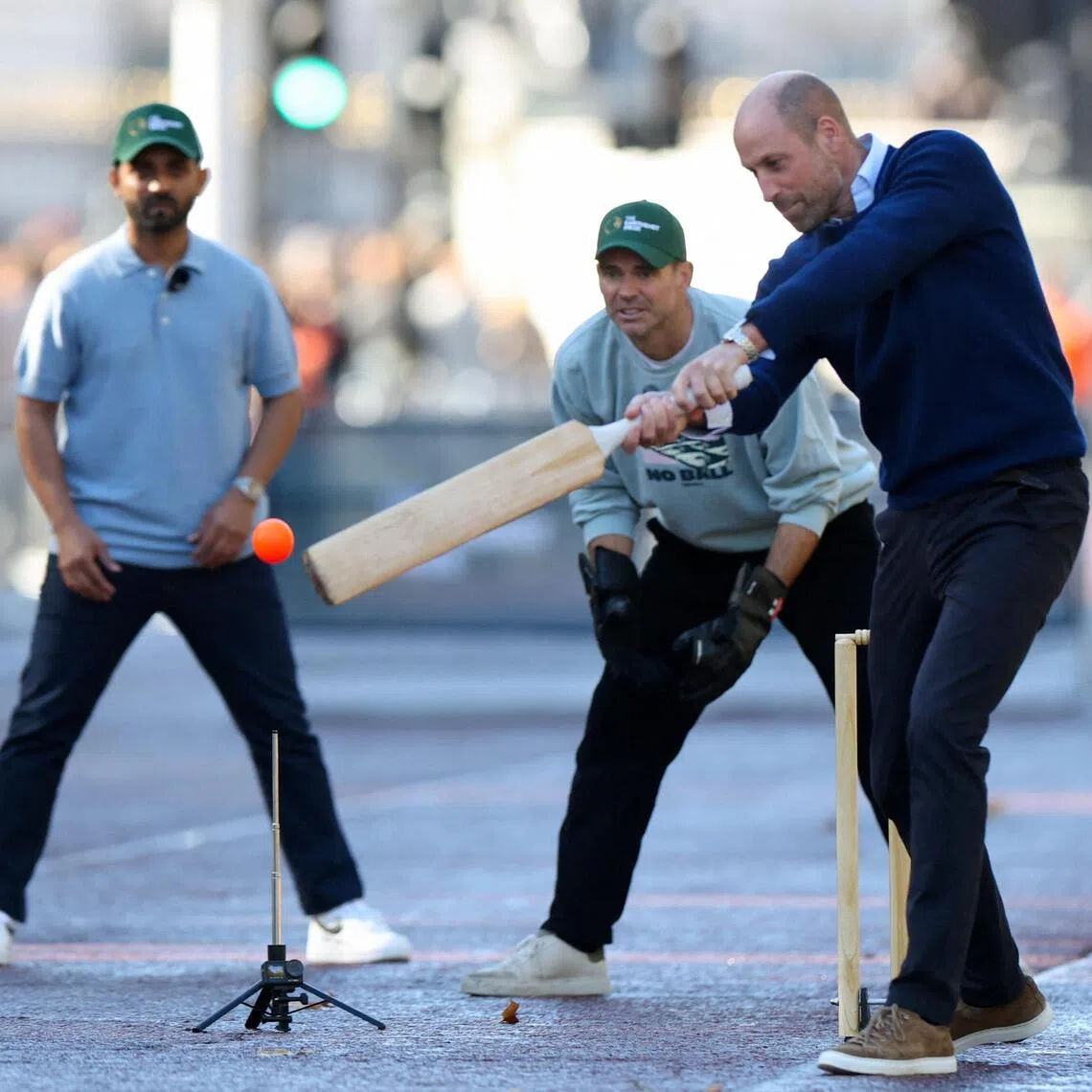 Britain’s Prince William hitting a shot on Oct 13 as he joins cricket stars for an informal game on The Mall in the lead-up to the annual Earthshot Prize awards in Mumbai next month.