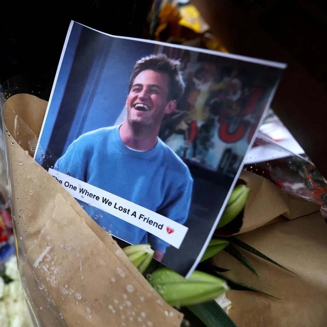 A 2023 photo shows a makeshift memorial for actor Matthew Perry, who was found dead at his Los Angeles home after drowning in his hot tub.