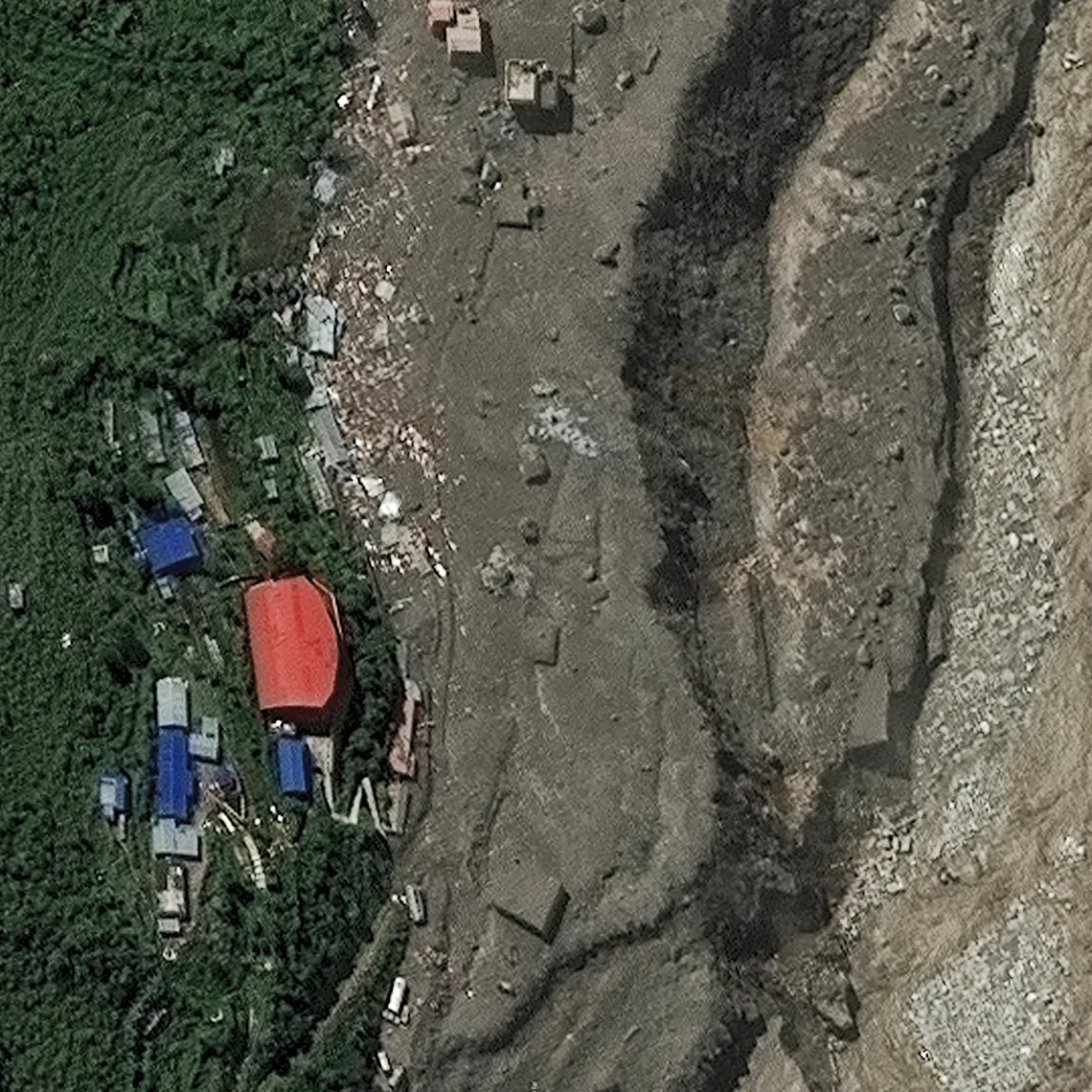 A satellite image shows a closer view of the remaining buildings and roads after flash floods and a mudslide, in Timure, Nepal, August 28, 2026. Vantor/Handout via REUTERS