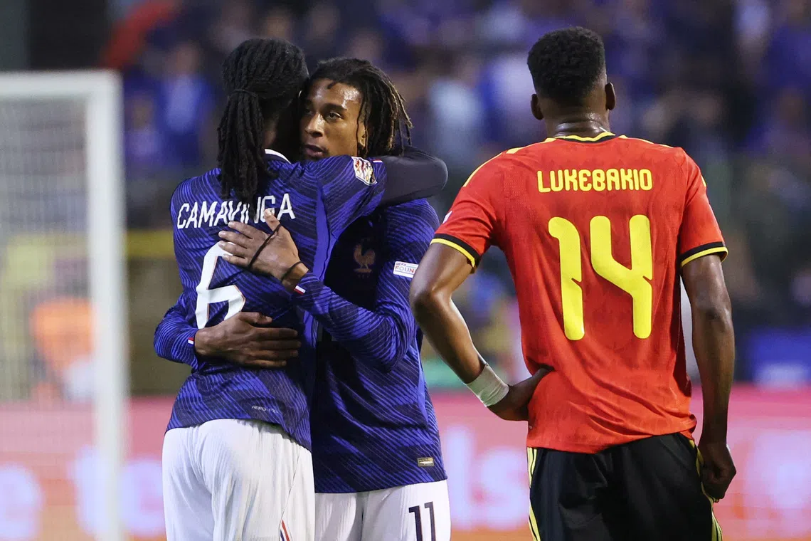 Soccer Football - UEFA Nations League - Group A1 - Belgium v France - King Baudouin Stadium, Brussels, Belgium - September 28, 2026 France's Michael Olise and Eduardo Camavinga celebrate after the match REUTERS/Omar Havana