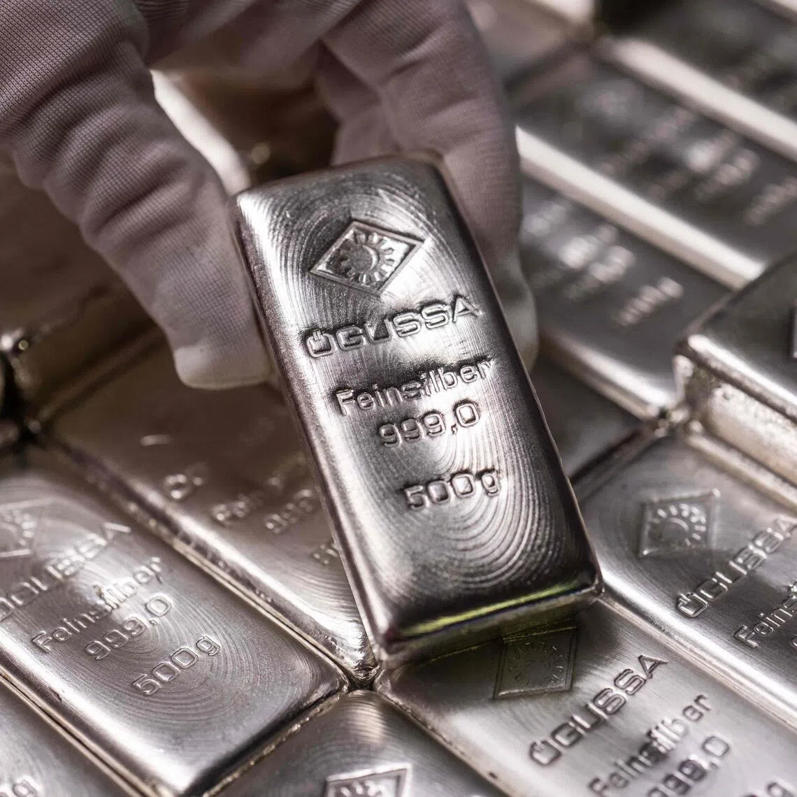 Spot silver tumbled to as low as US$64 an ounce early on Feb 6.