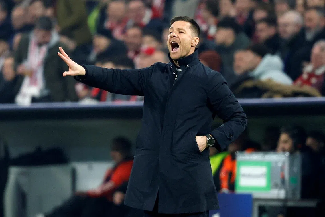 FILE PHOTO: Soccer Football - Champions League - Round of 16 - First Leg - Bayern Munich v Bayer Leverkusen - Allianz Arena, Munich, Germany - March 5, 2025  Bayer Leverkusen coach Xabi Alonso reacts REUTERS/Heiko Becker/File Photo