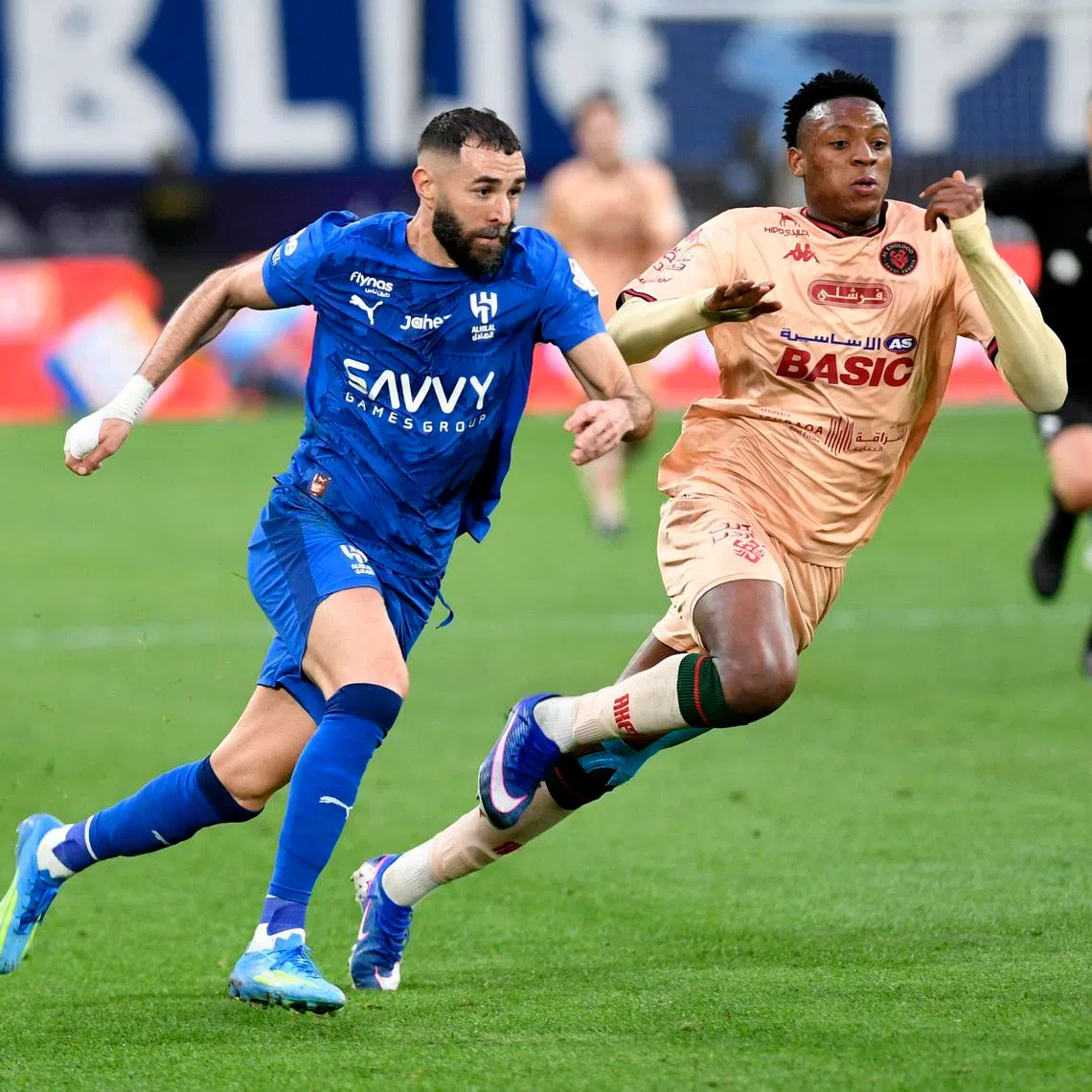 Soccer Football - Saudi Pro League - Al Hilal v Al Kholood - Kingdom Arena, Riyadh, Saudi Arabia - April 8, 2026 Al Hilal's Karim Benzema in action with Al Kholood's Mansour Camara REUTERS/Stringer