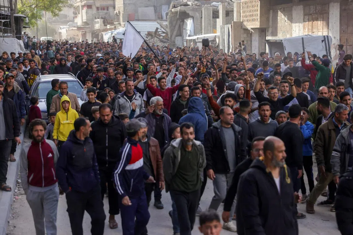 Palestinians the northern Gaza town of Beit Lahiya marched on Tuesday in a rally calling for an end to the war.