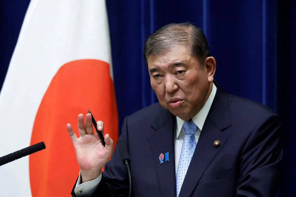 Japan's Prime Minister Shigeru Ishiba speaks at a press conference on June 23.