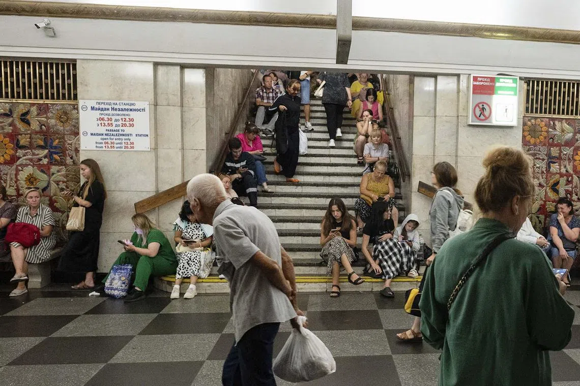 People taking shelter from shelling at a metro station in Kyiv, Ukraine, Aug 26, 2024, as Ukraine underwent a heavy Russian missile and drone attack. 