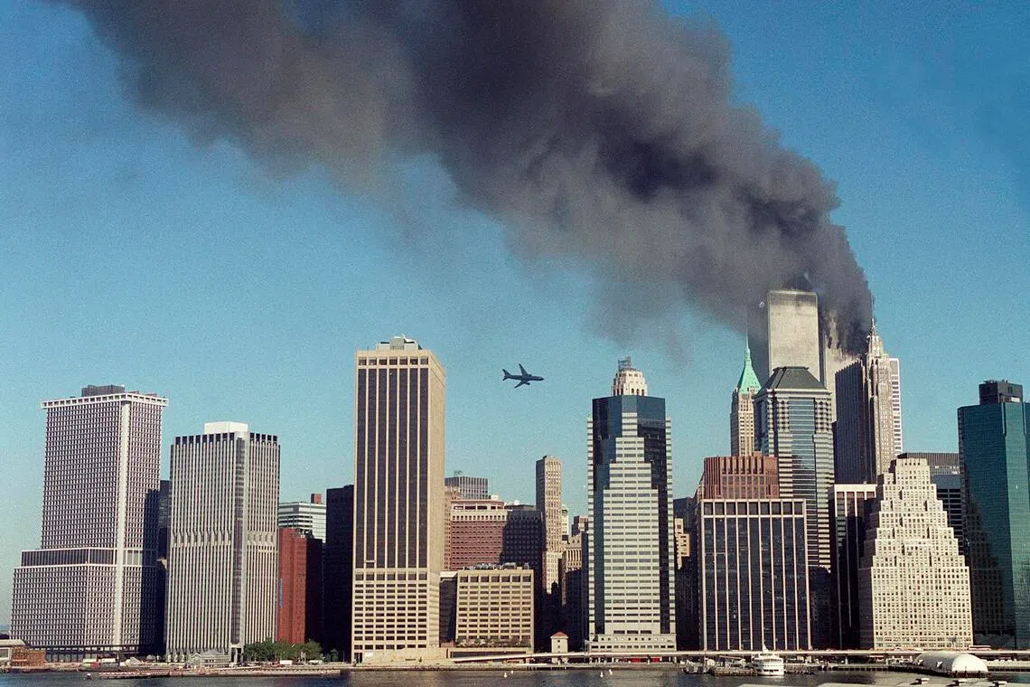 This photo captures the moment just before the hijacked United Airlines Flight 175 slammed into the South Tower of the World Trade Center on Sept 11, 2001.