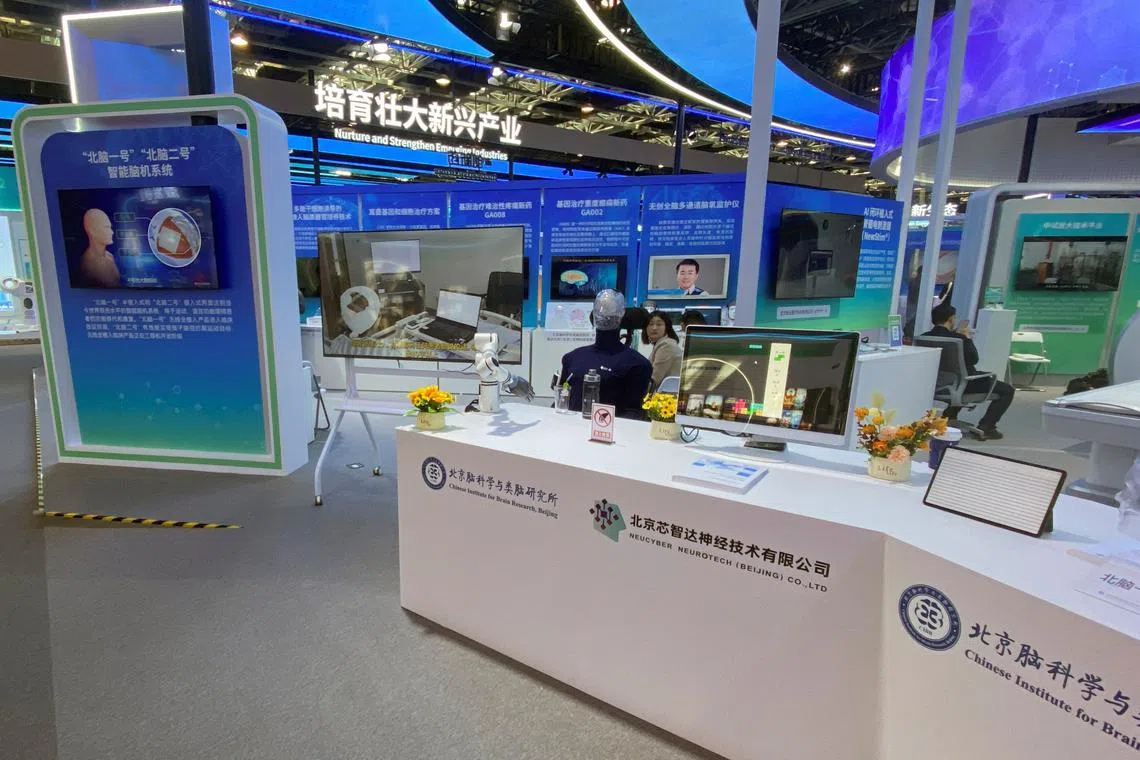 Chinese Institute for Brain Research, Beijing and NeuCyber Neurotech (Beijing) Co. Ltd host a booth displaying their brain chips at the Zhongguancun Forum in Haidian district, Beijing, China March 31, 2025.
