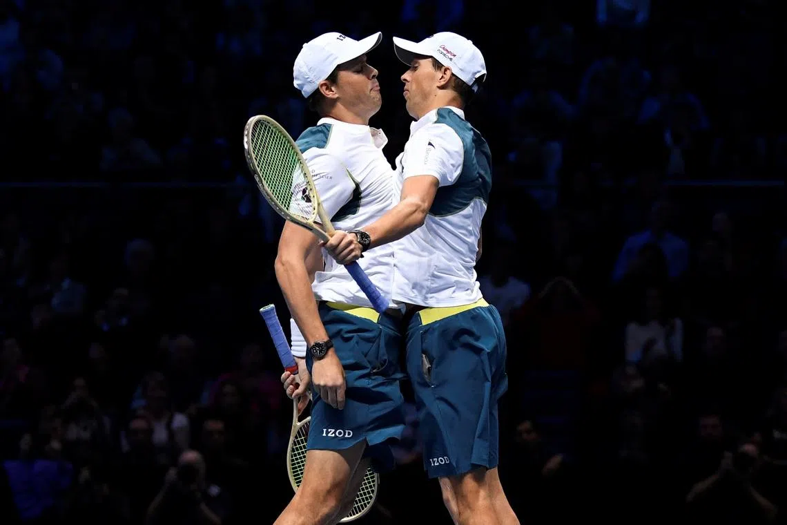 FILE PHOTO: Tennis - ATP World Tour Finals - The O2 Arena, London, Britain - November 13, 2017   USA's Bob Bryan and USA's Mike Bryan celebrate winning their group stage match against Great Britain's Jamie Murray and Brazil's Bruno Soares   Action Images via Reuters/Tony O'Brien/File Photo