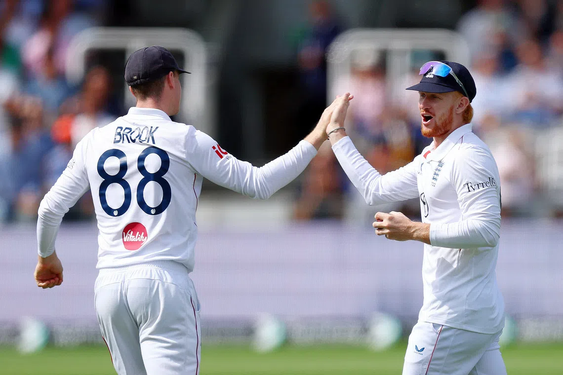 Cricket - Second Test - England v Pakistan - Lord's Cricket Ground, London, Britain - August 30, 2026 England's Jordan Cox celebrates with Harry Brook after taking a catch to dismiss Pakistan's Babar Azam off the bowling of Jofra Archer Action Images via Reuters/Matthew Childs