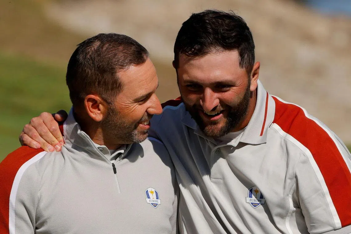 Team Europe's Jon Rahm (right) and Sergio Garcia celebrating on the 17th green after winning the match during the foursomes at the 2020 Ryder Cup.