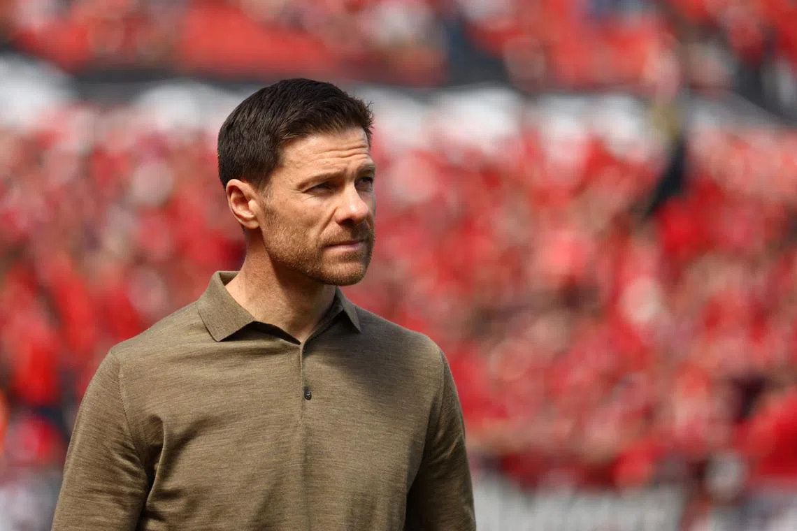 FILE PHOTO: Soccer Football - Bundesliga - Bayer Leverkusen v FC Augsburg - BayArena, Leverkusen, Germany - April 26, 2025 Bayer Leverkusen coach Xabi Alonso is seen at the stadium before the match REUTERS/Thilo Schmuelgen/File Photo