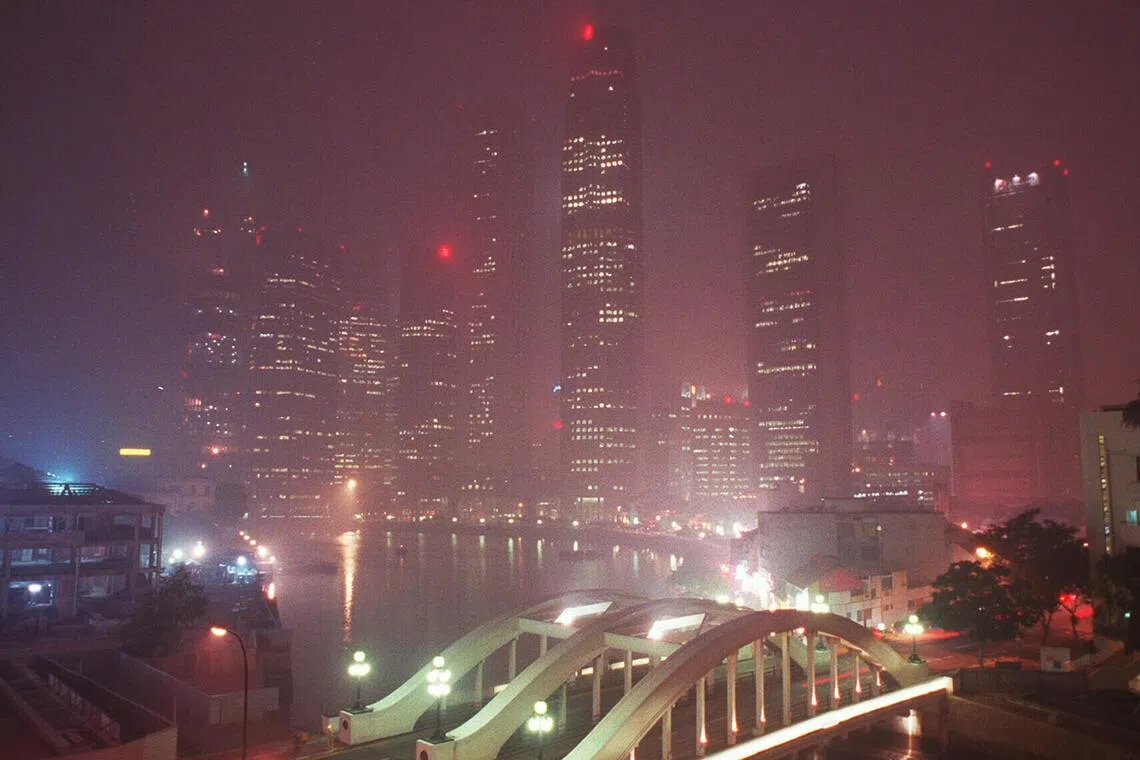 The central business district of Singapore shrouded in haze on the evening of Sept 18, 1997. The PSI reached a record 226 at 10pm.