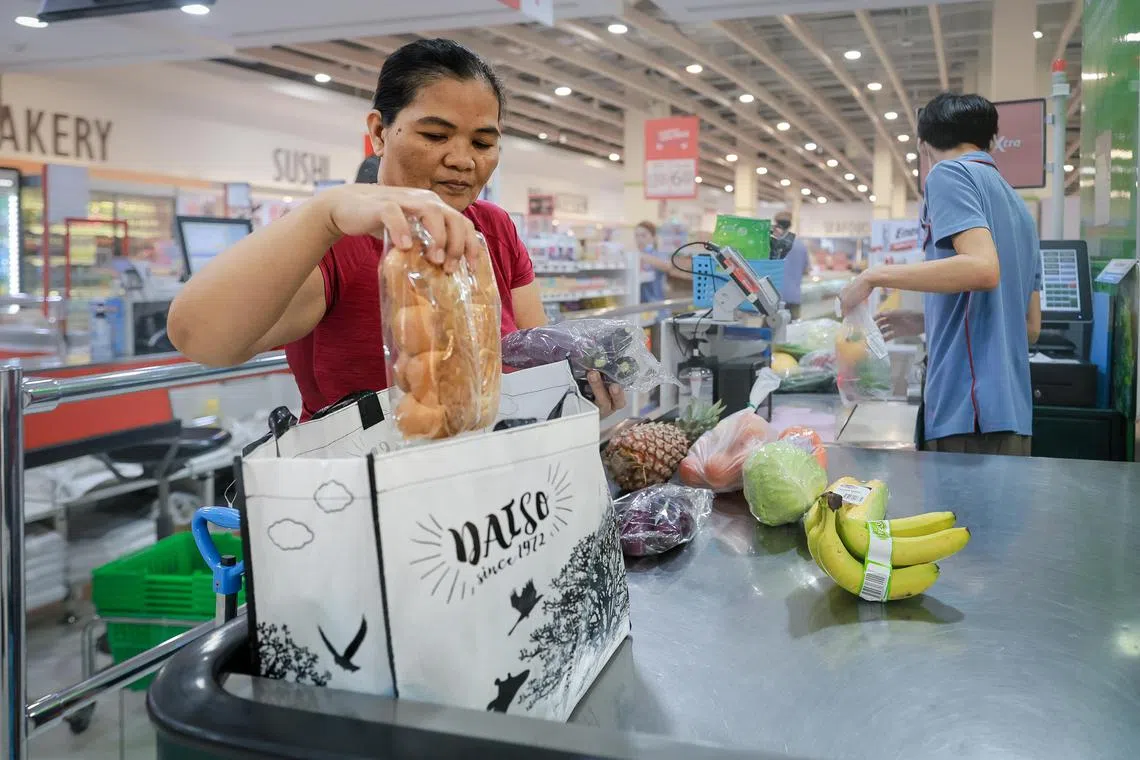 FairPrice has set up racks in seven outlets to encourage people to donate excess reusable bags for others to use.