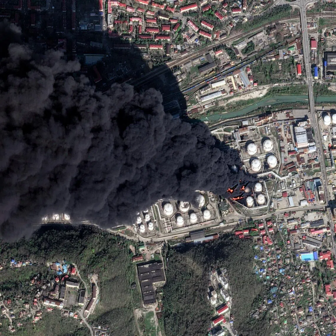 A satellite image shows smoke billowing from fire, following drone attacks on a Russian oil facility in the Black Sea port of Tuapse, Krasnodar Krai, Russia, April 16, 2026. Vantor/Handout via REUTERS