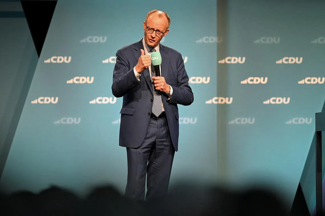 German conservative CDU candidate for chancellor Friedrich Merz speaks during a campaign event in Vechta, Germany, February 19, 2025. REUTERS/Carmen Jaspersen