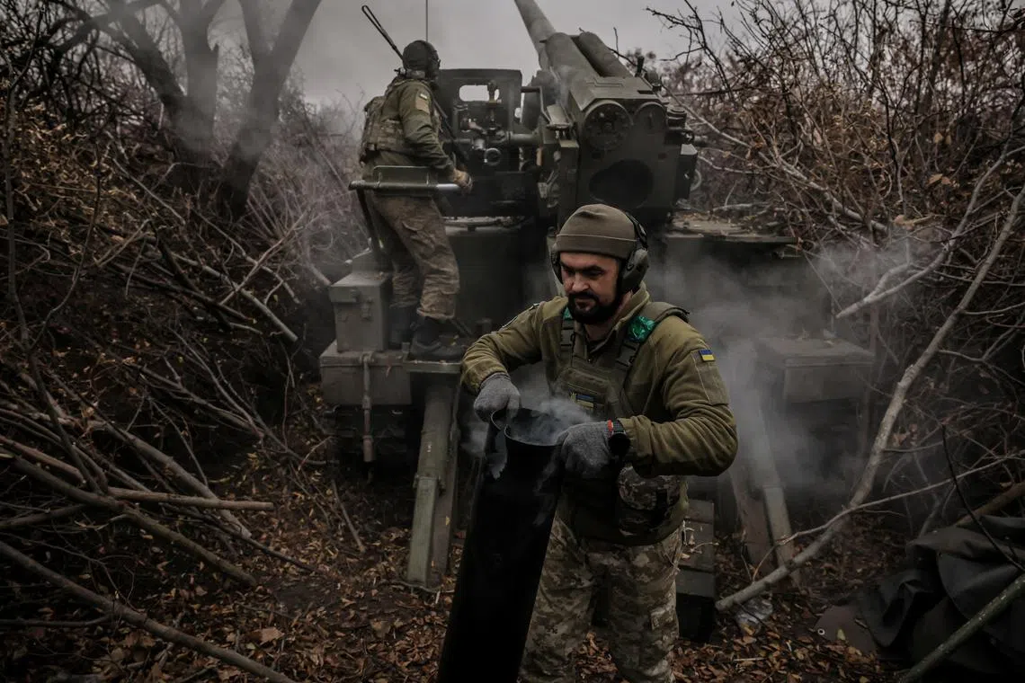 FILE PHOTO: A serviceman of 24th Mechanized brigade named after King Danylo of the Ukrainian Armed Forces fires a 2s5 \"Hyacinth-s\" self-propelled howitzer towards Russian troops at a front line, amid Russia's attack on Ukraine, near the town of Chasiv Yar in Donetsk region, Ukraine November 18, 2024. Oleg Petrasiuk/Press Service of the 24th King Danylo Separate Mechanized Brigade of the Ukrainian Armed Forces/Handout via REUTERS/File Photo