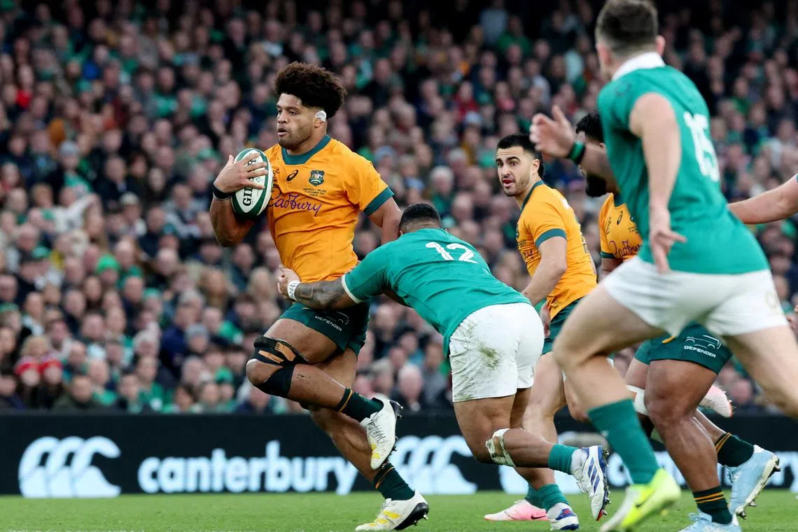 FILE PHOTO: Rugby Union - Autumn Internationals - Ireland v Australia - Aviva Stadium, Dublin, Ireland - November 30, 2024 Australia's Rob Valetini in action as he is tackled by Ireland's Bundee Aki REUTERS/Lorraine O'sullivan/File Photo