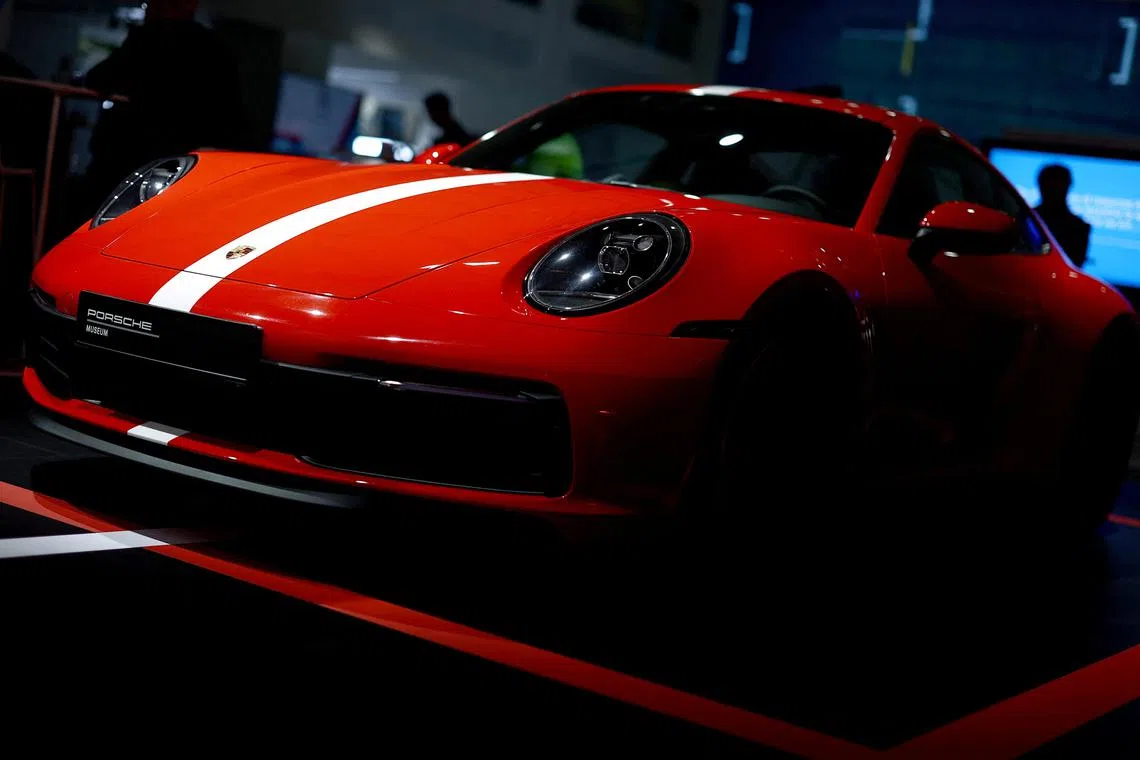 A Porsche 911 Carrera S is on display during the 75 years Porsche sports car exhibition "Driven by Dreams" in Berlin, Germany, January 25, 2023. REUTERS/ Lisi Niesner

