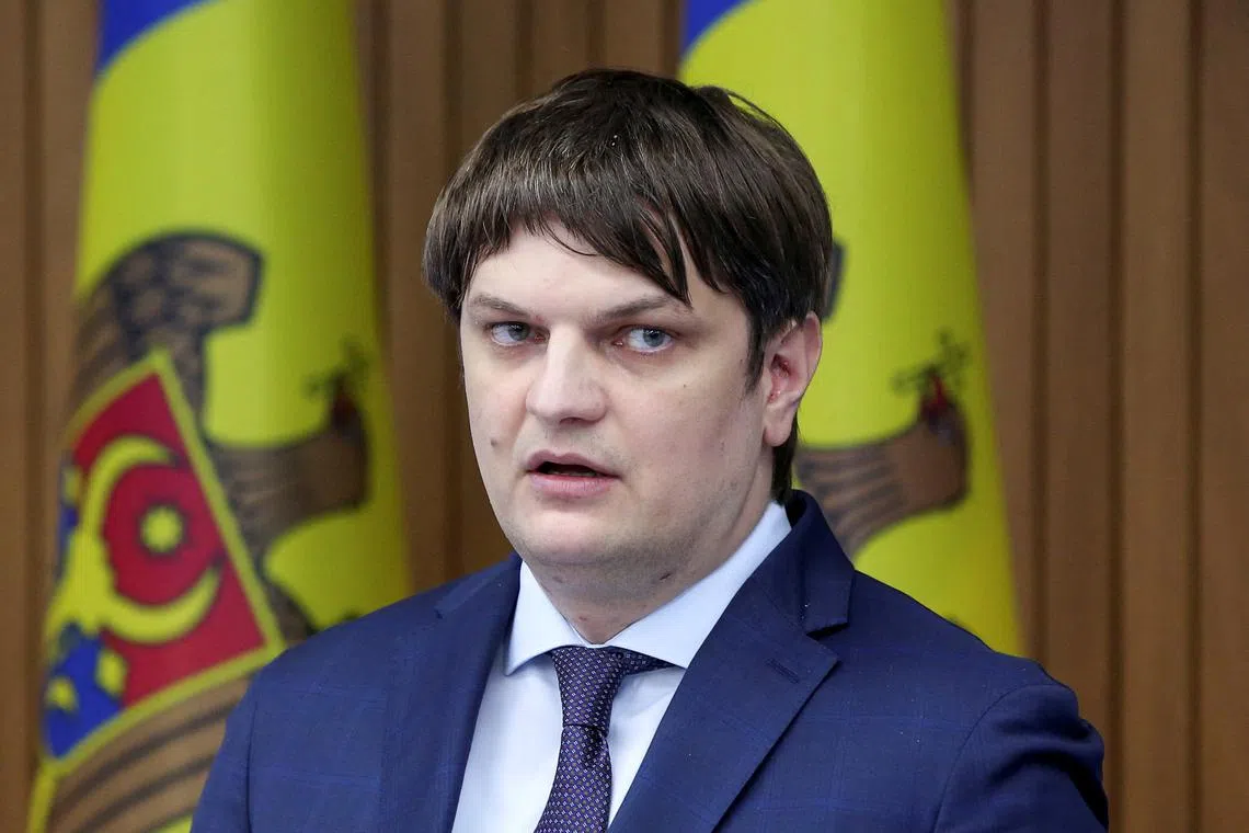 FILE PHOTO: Moldovan Deputy Prime Minister Andrei Spinu speaks during a news conference in Chisinau, Moldova November 1, 2021. REUTERS/Vladislav Culiomza/File Photo