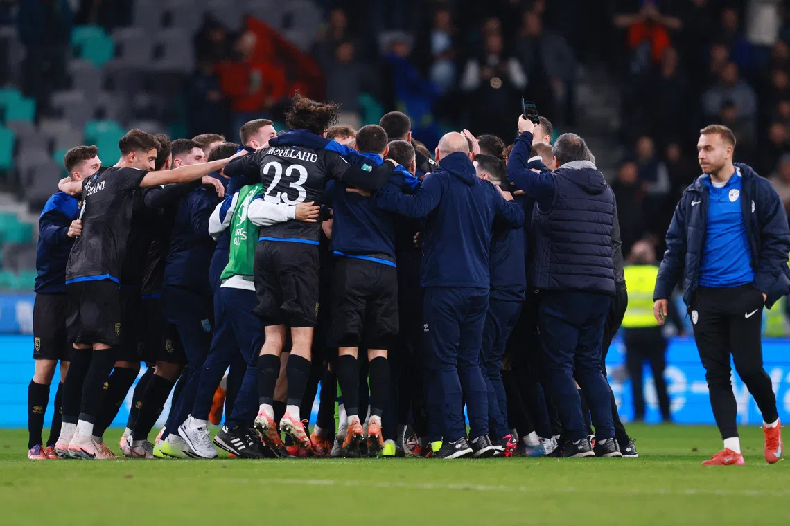 Soccer Football - FIFA World Cup - UEFA Qualifiers - Group B - Slovenia v Kosovo - Stadion Stozice, Ljubljana, Slovenia - November 15, 2025 Kosovo team members celebrate after the match REUTERS/Borut Zivulovic