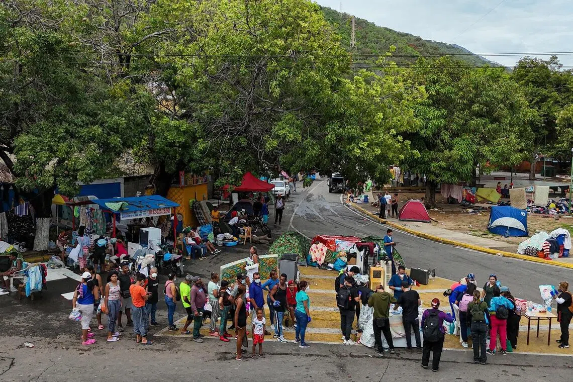 People lining up to receive medication at a health post in Caraballeda, La Guaira state, Venezuela, on June 30.