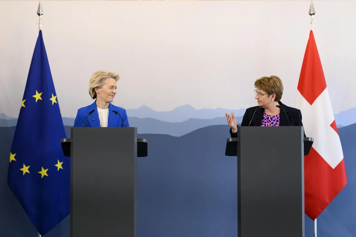 European Commission president Ursula von der Leyen (left) and Swiss Federal President Viola Amherd delivering a press briefing in Bern, Switzerland, on Dec 20.