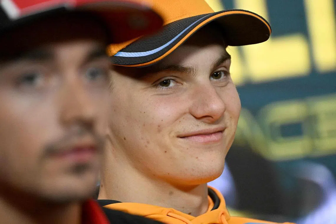 McLaren's Australian driver Oscar Piastri (R) attends a drivers press conference ahead of the 2023 Formula One Australian Grand Prix at the Albert Park Circuit in Melbourne on March 30, 2023. (Photo by WILLIAM WEST / AFP) / -- IMAGE RESTRICTED TO EDITORIAL USE - STRICTLY NO COMMERCIAL USE --