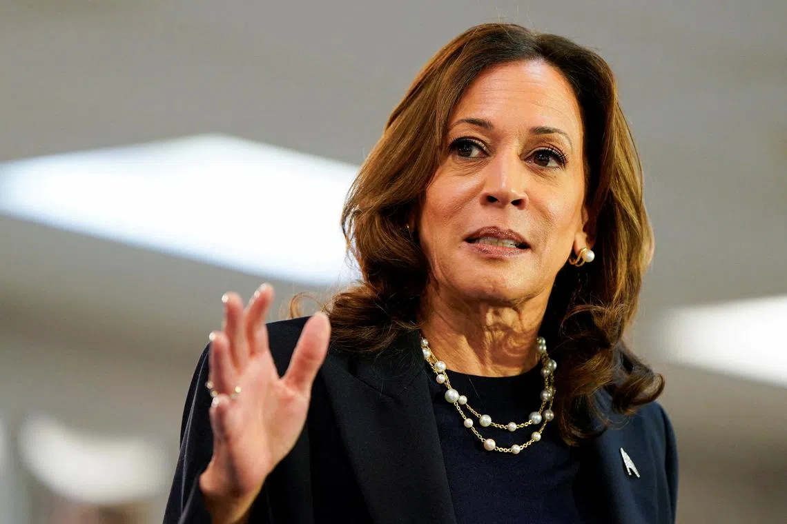 FILE PHOTO: U.S. Vice President and Democratic presidential candidate Kamala Harris speaks during a campaign event with Democratic vice presidential candidate, Minnesota Governor Tim Walz, at the United Auto Workers (UAW) Local 900 in Wayne, Michigan, U.S., August 8, 2024. REUTERS/Elizabeth Frantz/File Photo