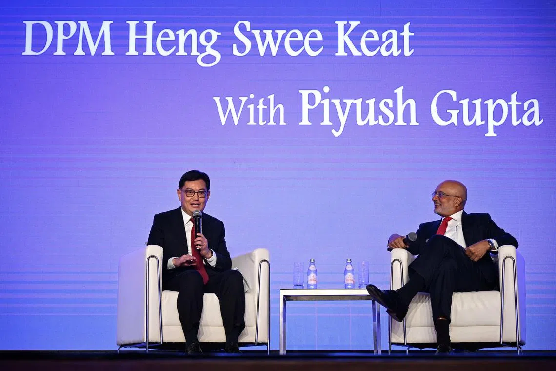 Slug: tgabs28
ST PHOTO: Chong Jun Liang

From left: DPM Heng Swee Keat and Piyush Gupta, ABS chairman, group CEO, DBS group in a fireside chat at the 51st Association of Banks in Singapore (ABS) Annual Dinner on June 28, 2024