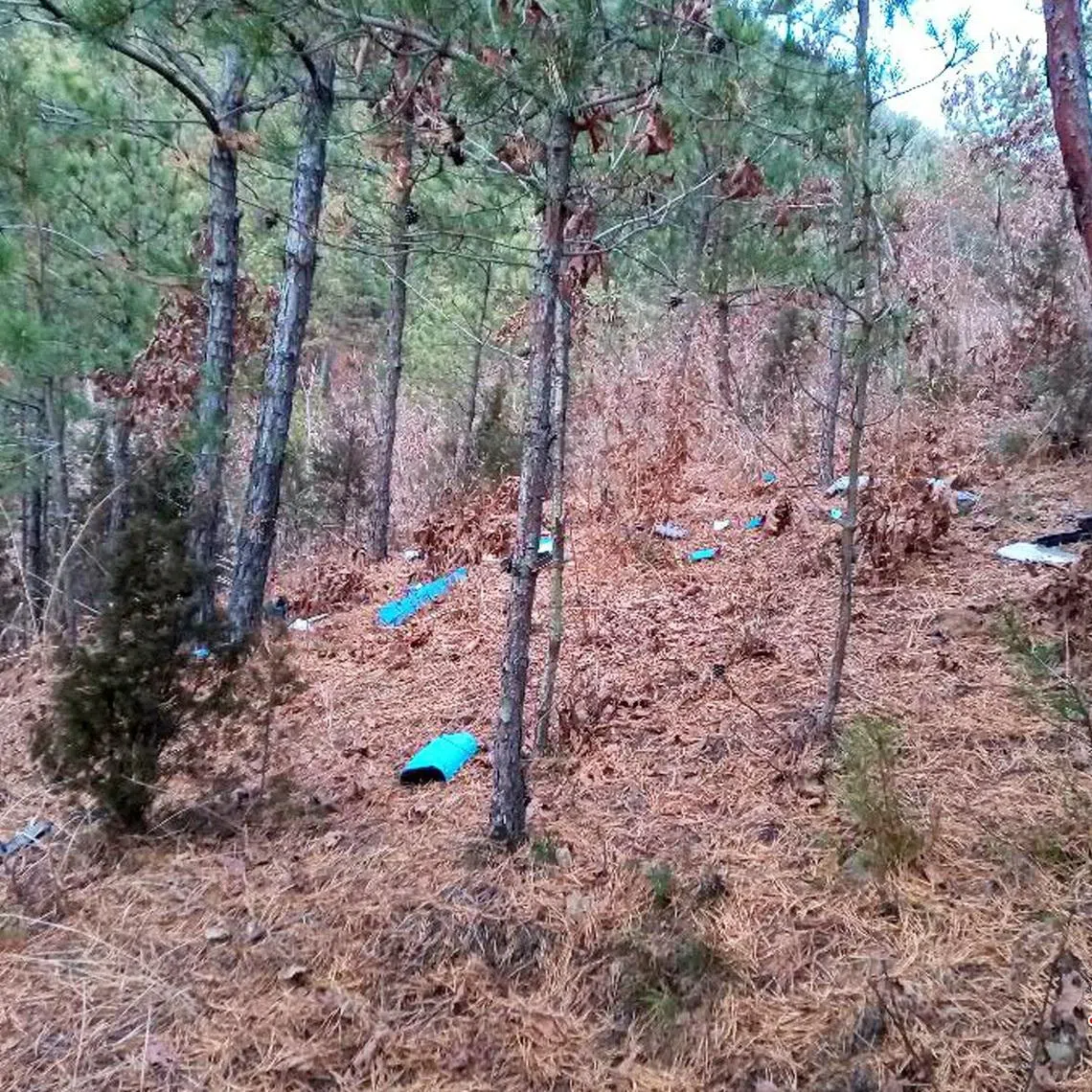 Fragments of a drone lie scattered on the ground in Muksan-ri area, Kaepung District, Kaesong City, North Korea.