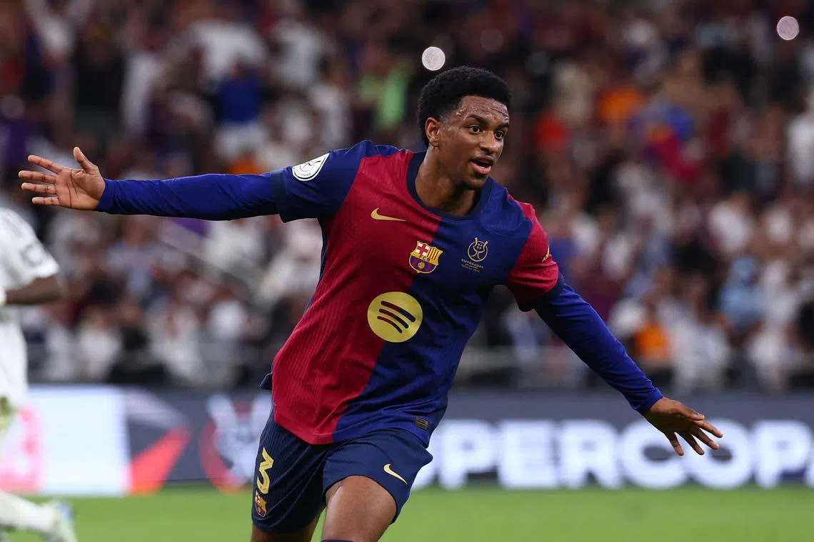 Soccer Football - Spanish Super Cup - Final - FC Barcelona v Real Madrid - King Abdullah Sports City, Jeddah, Saudi Arabia - January 12, 2025 FC Barcelona's Alejandro Balde celebrates scoring their fourth goal REUTERS/Pedro Nunes/ File Photo