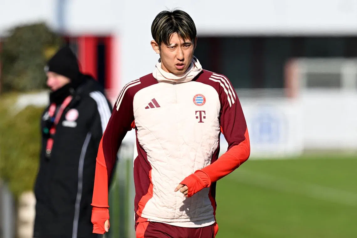 FILE PHOTO: Soccer Football - Champions League - Knockout Phase Playoff - Second Leg - Bayern Munich Training - Saebener Strasse, Munich, Germany - February 17, 2025 Bayern Munich's Hiroki Ito during training REUTERS/Angelika Warmuth/File Photo