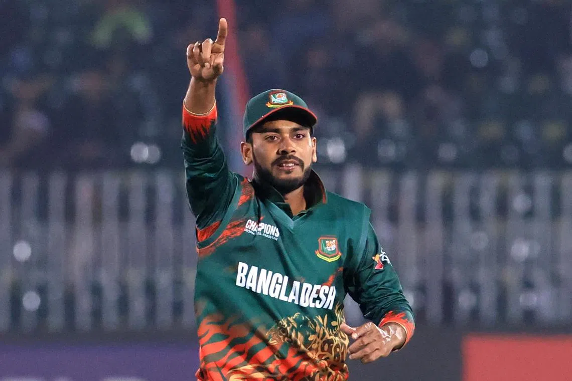 FILE PHOTO: Cricket - ICC Men's Champions Trophy - Group A - New Zealand v Bangladesh - Rawalpindi Cricket Stadium, Rawalpindi, Pakistan - February 24, 2025 Bangladesh's Mehidy Hasan Miraz reacts REUTERS/Akhtar Soomro/ File Photo