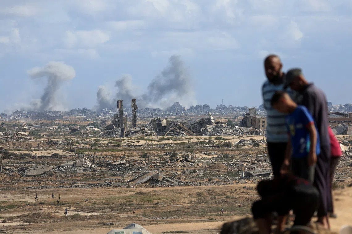 Smoke rising following explosions during the Israeli military offensive in Gaza City, as seen from the central Gaza Strip, on Oct 6, 2025. 