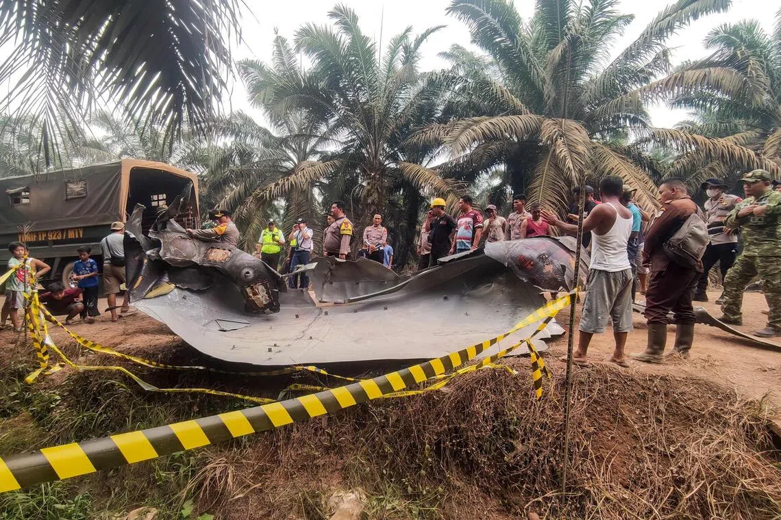 Indonesian authorities were investigating on Oct 20 after a piece of rocket the size of a car crashed into an oil palm plantation.