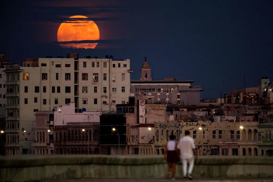 A blue supermoon, the second full moon of a calendar month, rising over Havana, Cuba, on Aug 30, 2023. 