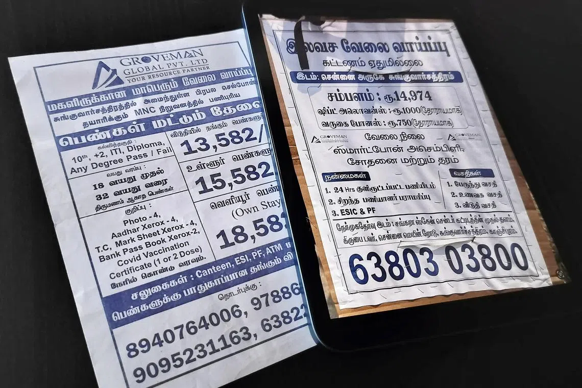 A pamphlet distributed in Sriperumbudur, India by Foxconn hiring vendor Groveman Global in March 2023, which sought applications from unmarried women aged 18 to 32, is seen next to a new Groveman pamphlet, reviewed by Reuters in October 2024, that contains no mention of age, gender or marital requirements, displayed on a screen, in this picture illustration taken November 12, 2024. REUTERS/Praveen Paramasivam/Illustration