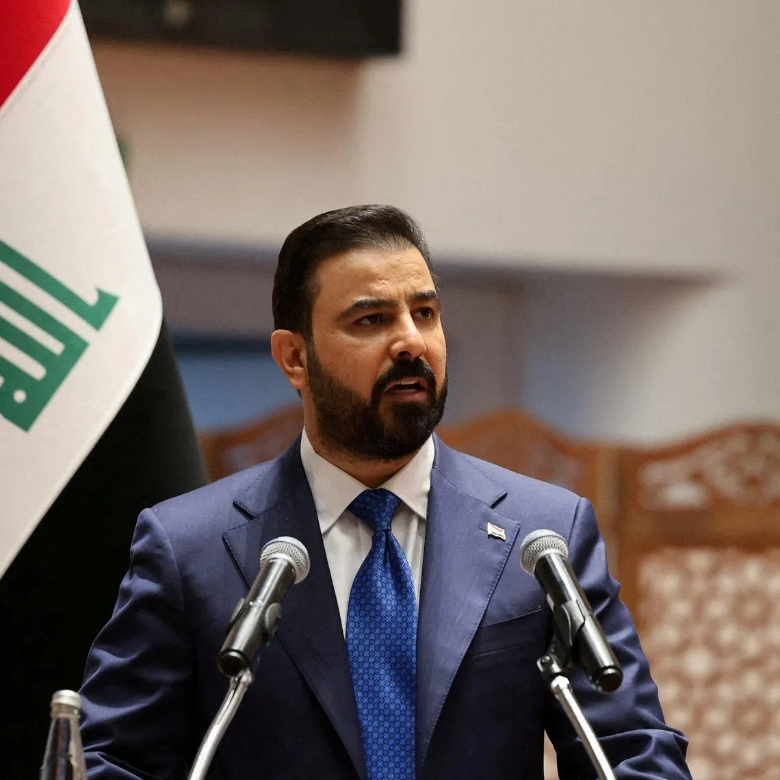 FILE PHOTO: Iraqi Prime Minister-designate Ali al-Zaidi speaks during a parliamentary session to vote in a new government headed by Ali al-Zaidi as prime minister, at the parliament headquarters in Baghdad, Iraq, May 14, 2026. REUTERS/Ahmed Saad/File Photo