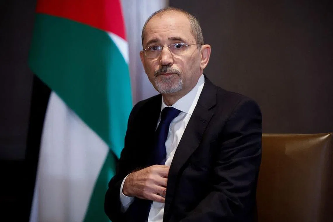FILE PHOTO: Jordanian Foreign Minister Ayman Safadi looks on during a meeting with U.S. Secretary of State Antony Blinken, during Blinken's week-long trip aimed at calming tensions across the Middle East, in Amman, Jordan, January 7, 2024. REUTERS/Evelyn Hockstein/File Photo