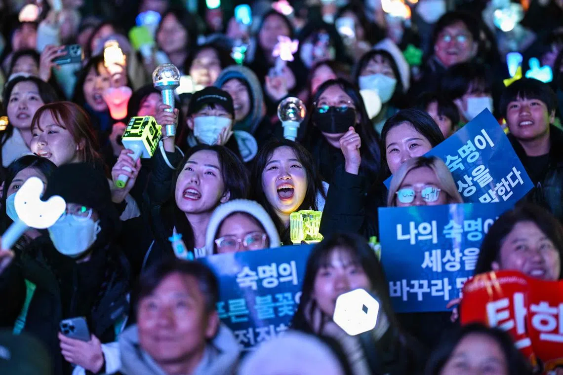 Protesters calling for the ouster of South Korea President Yoon Suk Yeol react after the result of the second martial law impeachment vote.