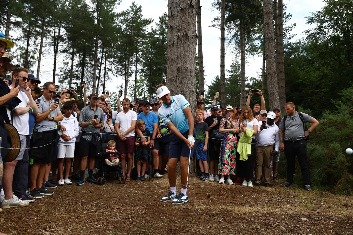 Lee Westwood is watched by many during the LIV Golf Invitational event in London in July.